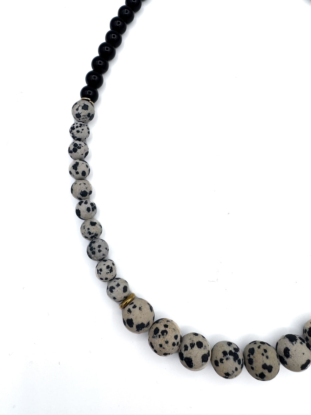 lapisatelier.com beaded statement necklace featuring black beads and spotted Dalmatian jasper with gold-toned accents