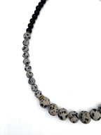 lapisatelier.com beaded statement necklace featuring black beads and spotted Dalmatian jasper with gold-toned accents
