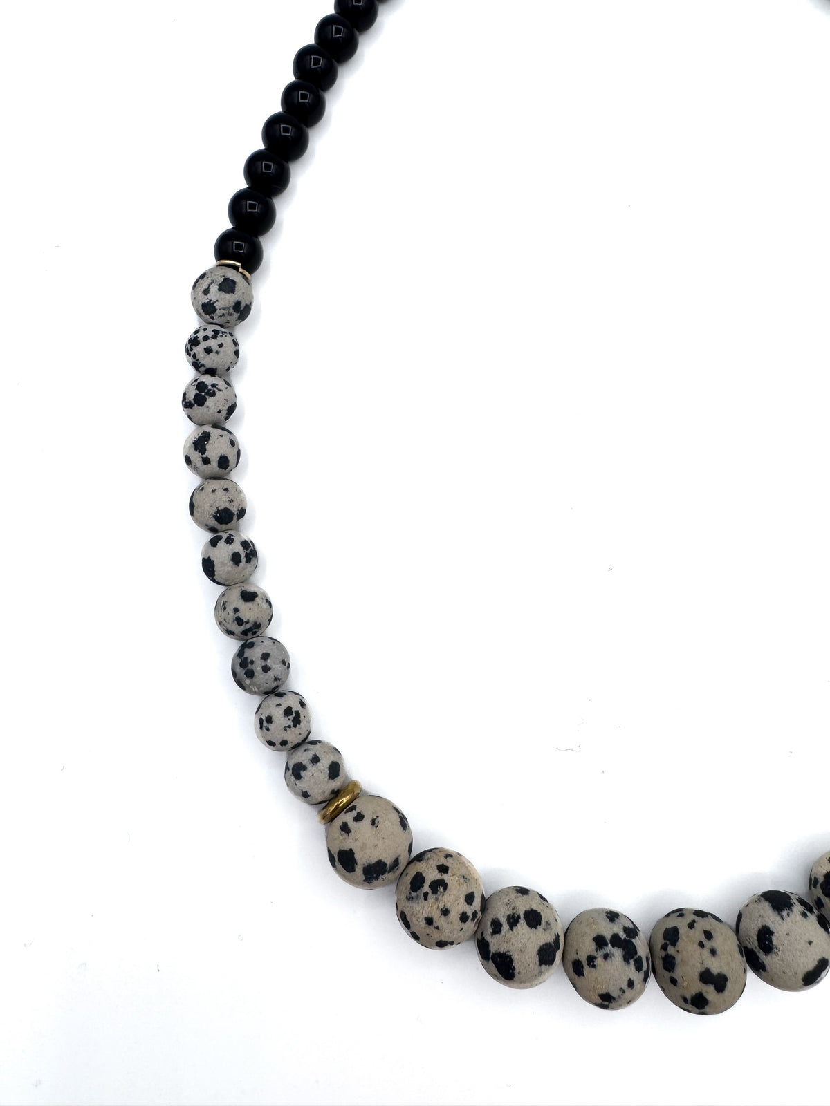lapisatelier.com beaded statement necklace featuring black beads and spotted Dalmatian jasper with gold-toned accents