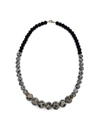 lapisatelier.com beaded statement necklace with black beads and spotted Dalmatian jasper featuring gold-toned accents